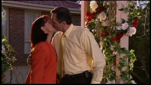 Susan and Karl kissing